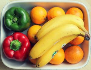 fruits and vegetables in a bin